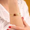 Bracelet ajustable Taratata Bijoux Orient en métal doré avec perles en verre et Cornaline